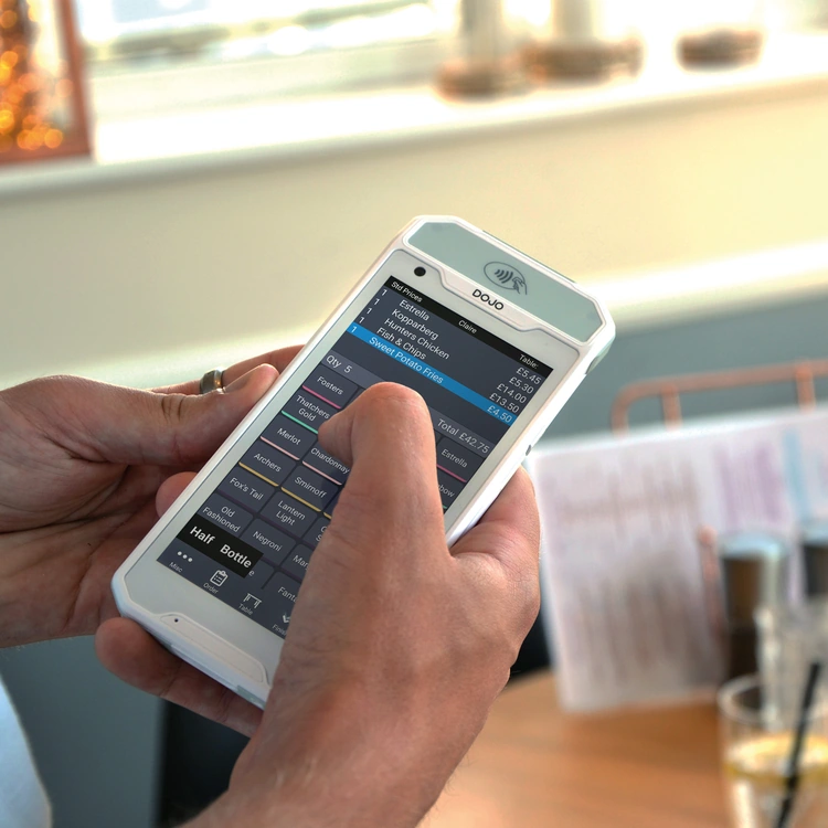 Hospitality team using PocketTouch handheld ordering in a venue